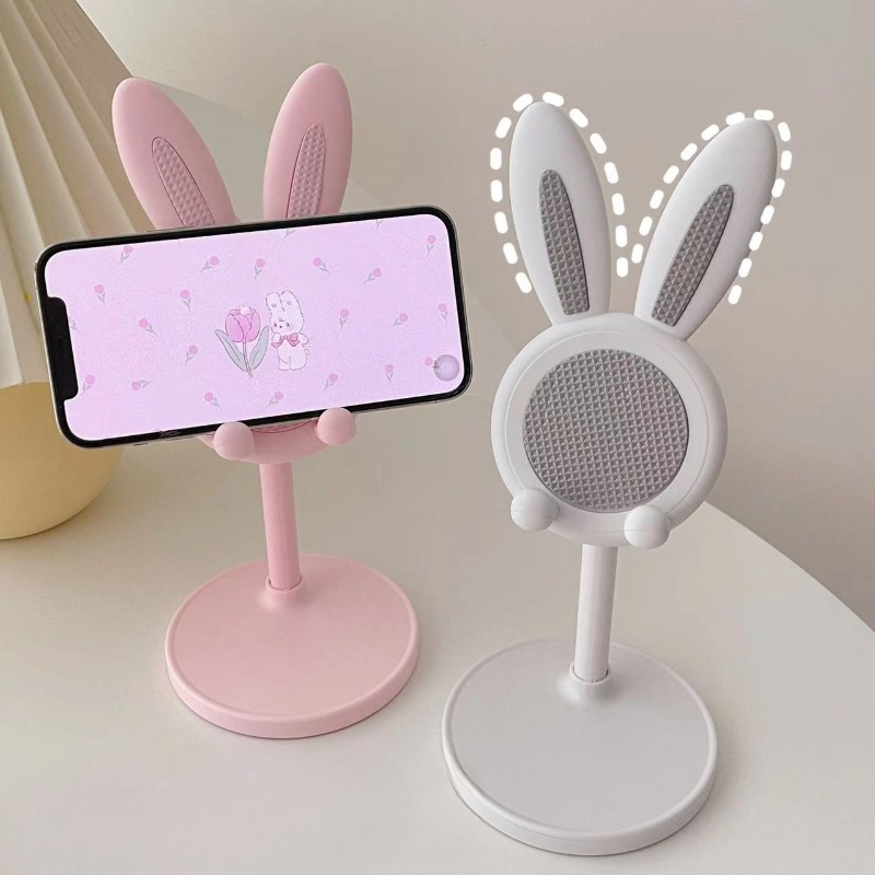 El lindo soporte para teléfono móvil Rabbit de escritorio