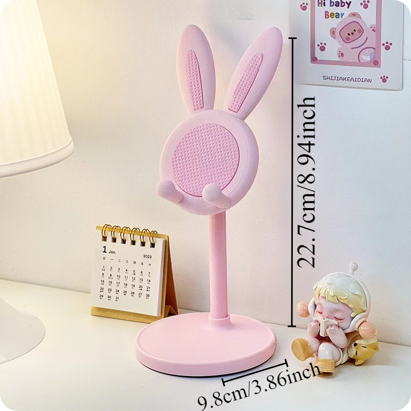 El lindo soporte para teléfono móvil Rabbit de escritorio